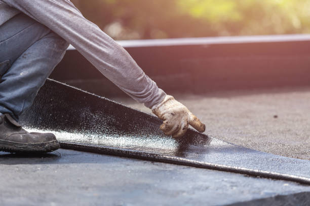 Professional Basement Waterproofing technician working in Alpha, OH